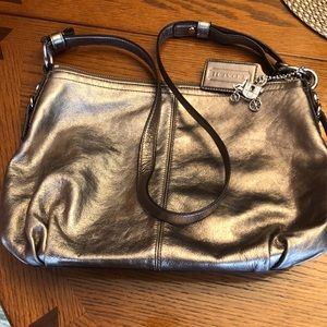 Coach purse.  Gently used.  Beautiful neutral metallic